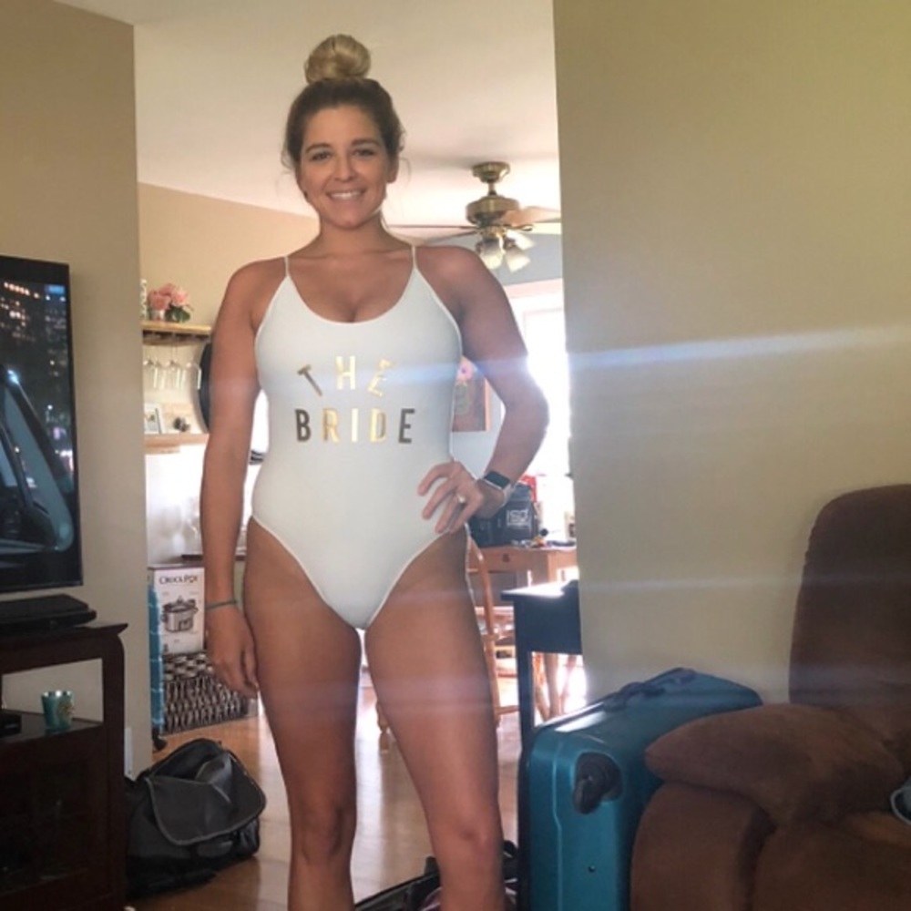 White “The Bride” strapping one piece bathing suit